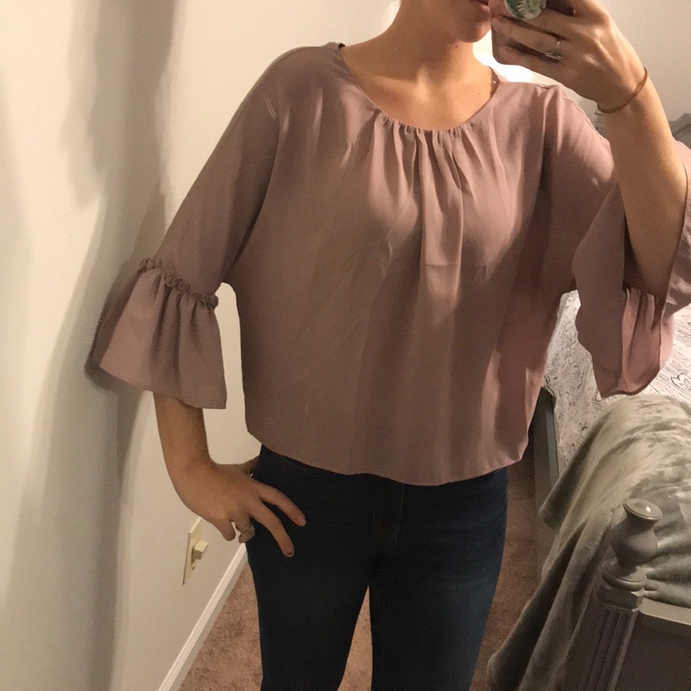 Blush blouse with peplum sleeves